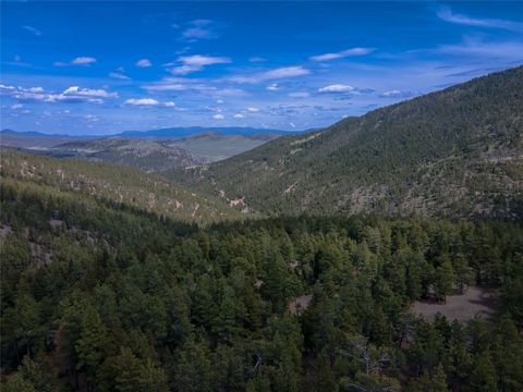 Tiny photo for 1300 Rogers Creek Road, Wolf Creek, MT 59648 (MLS # 30070738)