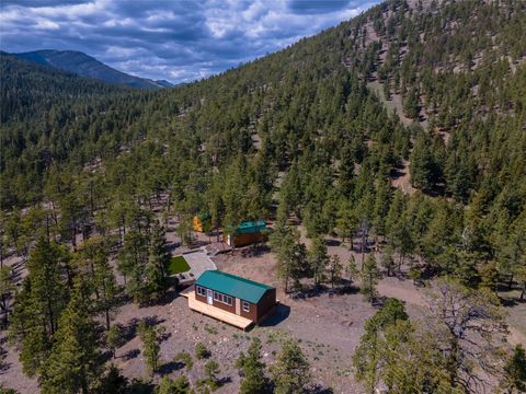 Tiny photo for 1300 Rogers Creek Road, Wolf Creek, MT 59648 (MLS # 30070738)