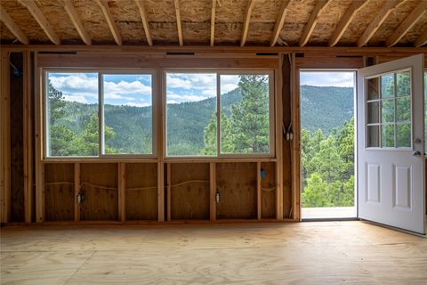 Tiny photo for 1300 Rogers Creek Road, Wolf Creek, MT 59648 (MLS # 30070738)