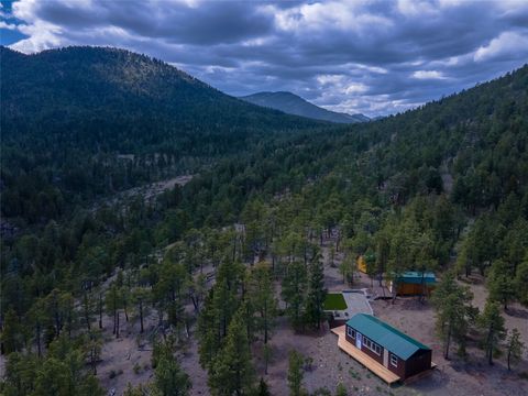 Tiny photo for 1300 Rogers Creek Road, Wolf Creek, MT 59648 (MLS # 30070738)
