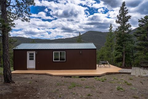 Tiny photo for 1300 Rogers Creek Road, Wolf Creek, MT 59648 (MLS # 30070738)
