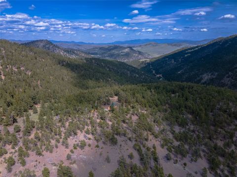 Tiny photo for 1300 Rogers Creek Road, Wolf Creek, MT 59648 (MLS # 30070738)