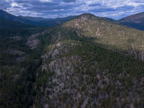 Tiny photo for 1300 Rogers Creek Road, Wolf Creek, MT 59648 (MLS # 30070738)