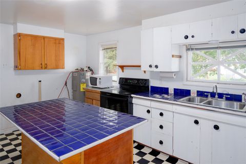Tiny photo for 34 White Avenue, Libby, MT 59923 (MLS # 30071639)