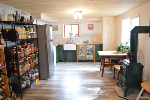 Tiny photo for 1449 Grizzly Spur, West Glacier, MT 59936 (MLS # 30066656)