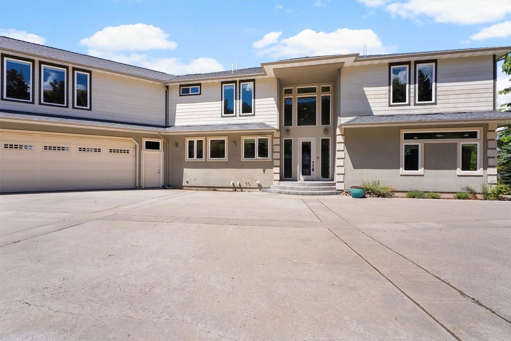 Photo of 901 Ben Hogan Drive, Missoula, MT 59803 (MLS # 30068607)