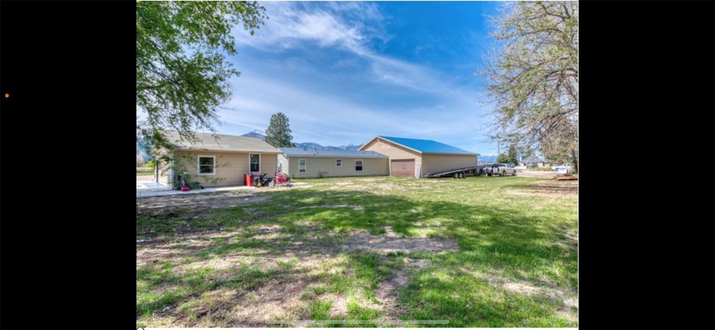 Photo of 810 Sleeping Child Road, Hamilton, MT 59840 (MLS # 30020536)