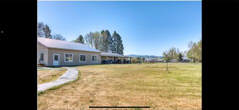 Photo of 810 Sleeping Child Road, Hamilton, MT 59840 (MLS # 30020536)