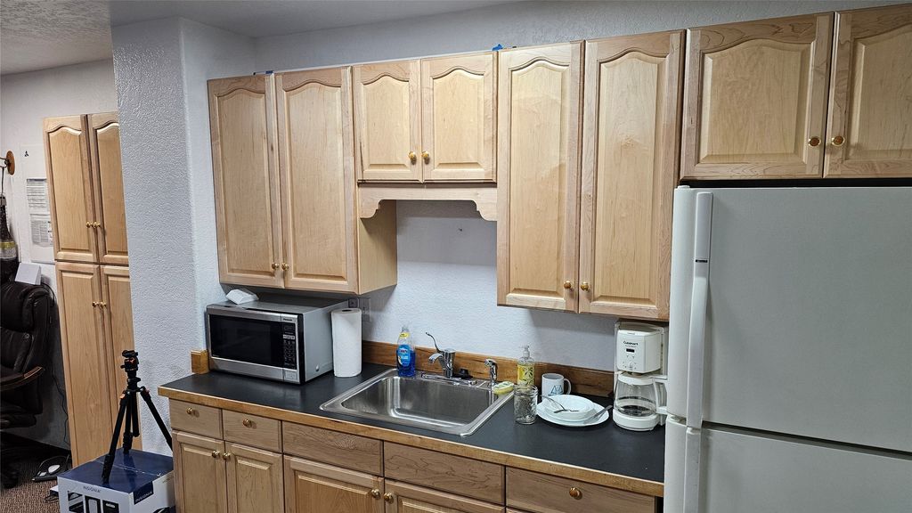 Photo of 144 &amp; 152 Taxilane 3 N, Kalispell, MT 59901 (MLS # 30068908)