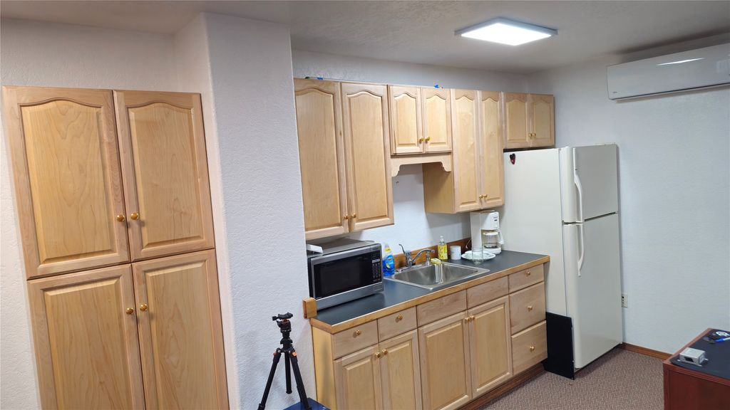 Photo of 144 &amp; 152 Taxilane 3 N, Kalispell, MT 59901 (MLS # 30068908)