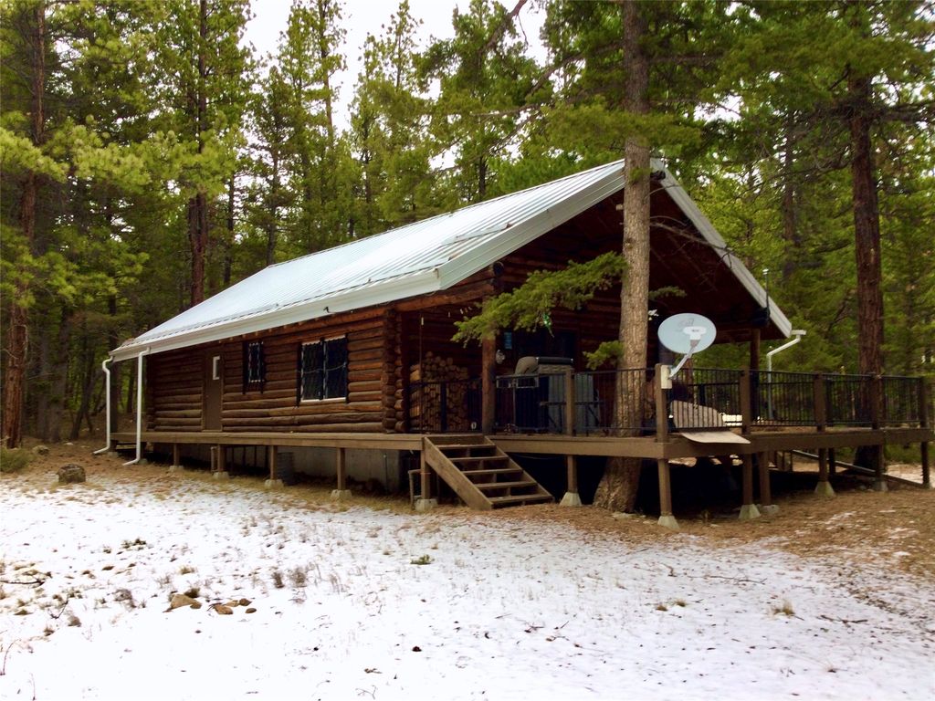 Photo of 3925 Little Wolf Creek Road, Wolf Creek, MT 59648 (MLS # 30064975)