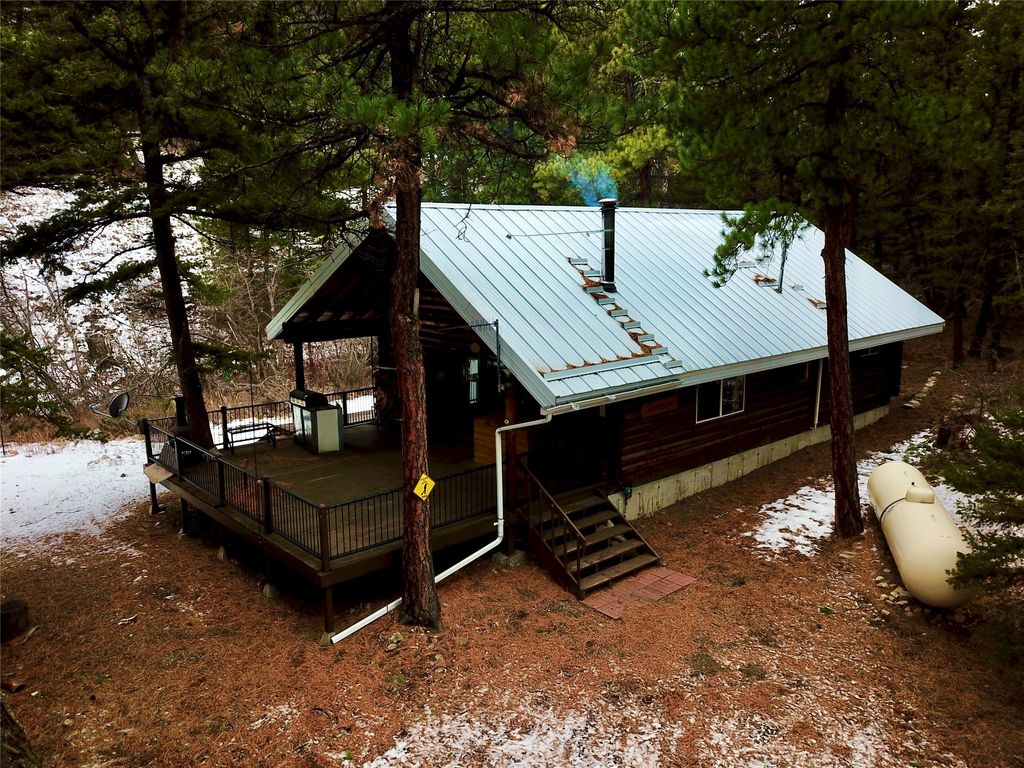 Photo of 3925 Little Wolf Creek Road, Wolf Creek, MT 59648 (MLS # 30064975)