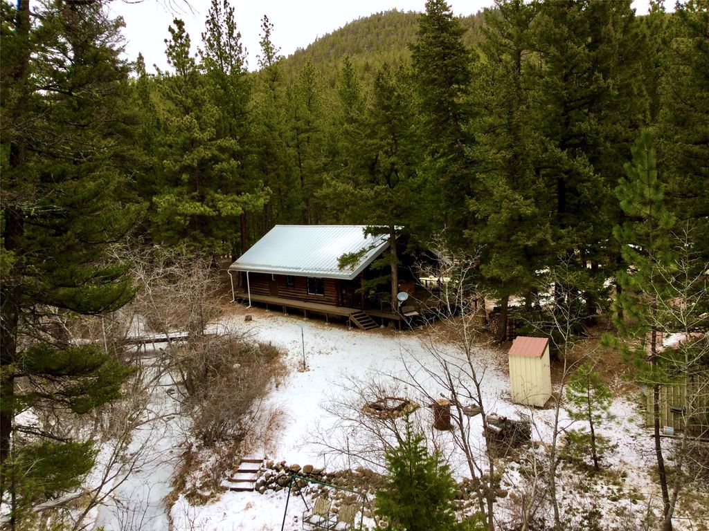 Photo of 3925 Little Wolf Creek Road, Wolf Creek, MT 59648 (MLS # 30064975)