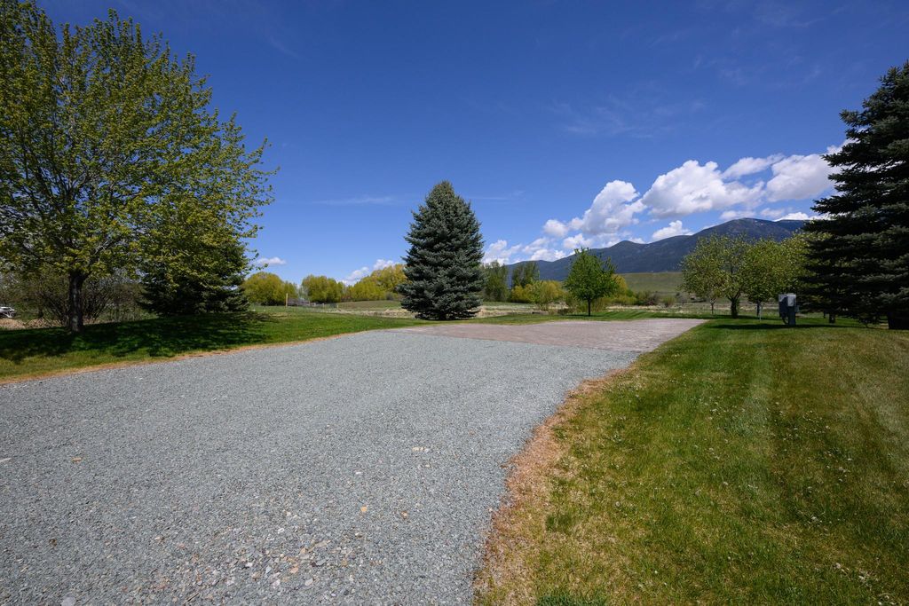 Photo of 446 Kingfisher Loop, Eureka, MT 59917 (MLS # 30067853)