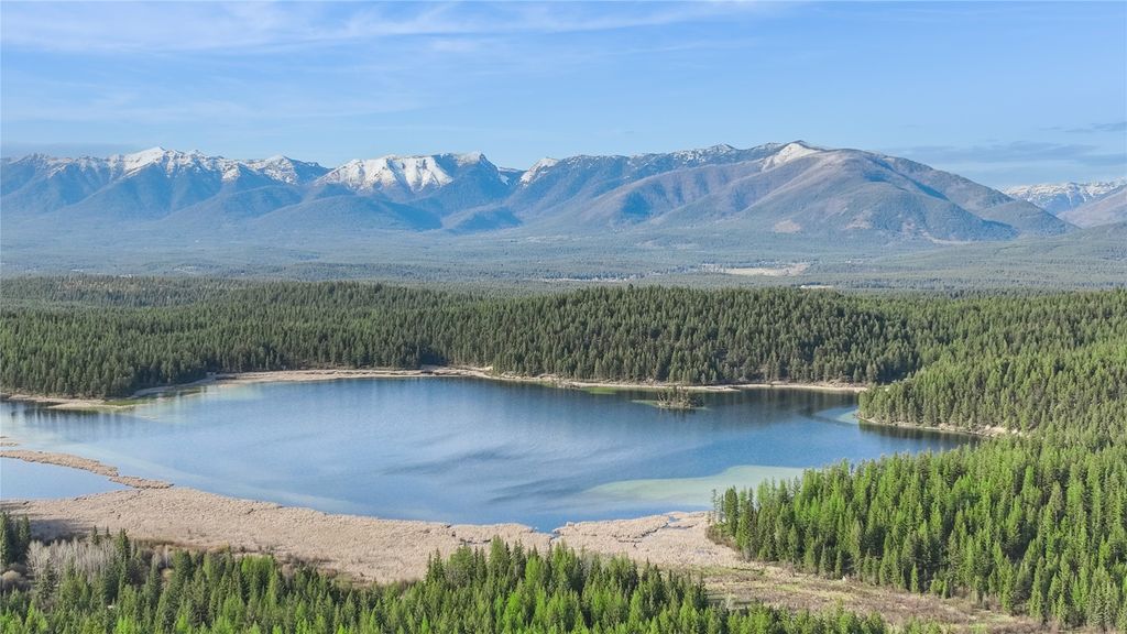 Photo of 2096 Marl Lake Creek Road, Eureka, MT 59917 (MLS # 30067326)
