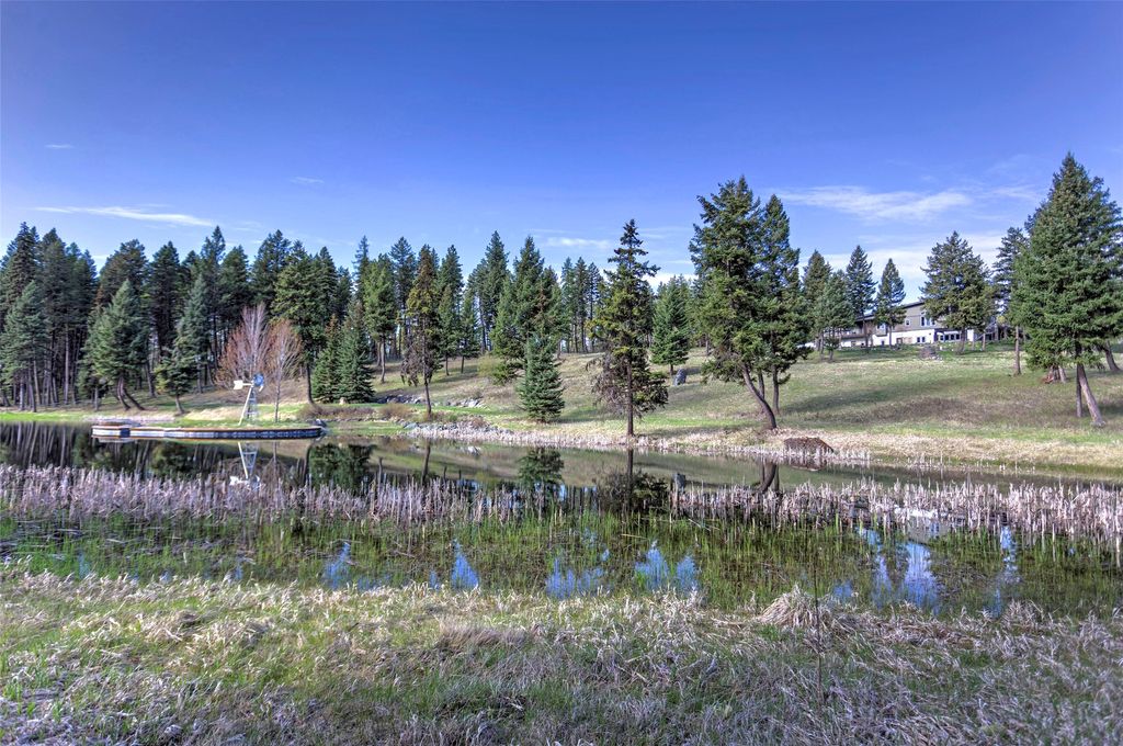 Photo of Trego, MT 59934 (MLS # 30070534)