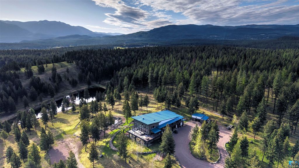 Photo of Trego, MT 59934 (MLS # 30070534)