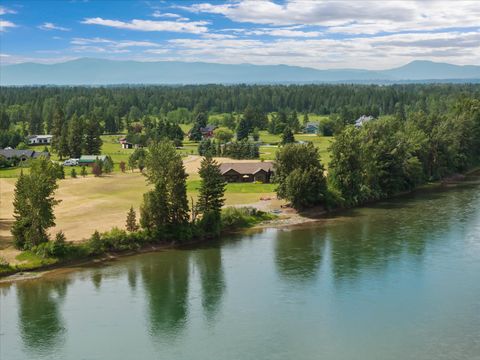 Photo of 1398 Waters Edge Way, Columbia Falls, MT 59912 (MLS # 30064731)