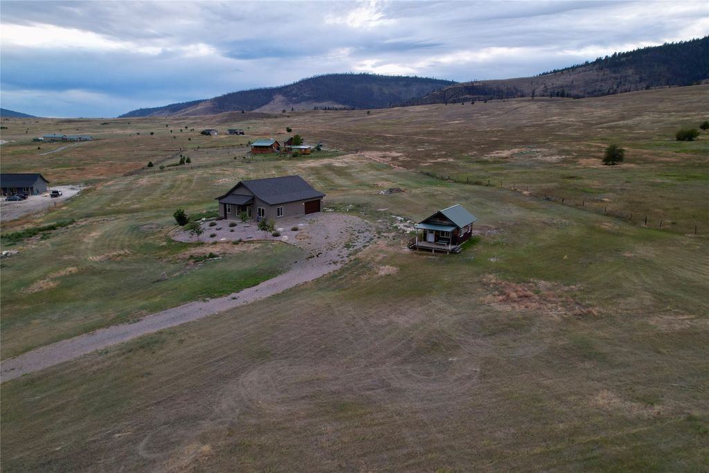 Photo of 25421 Three Moon Drive, Elmo, MT 59915 (MLS # 30069825)