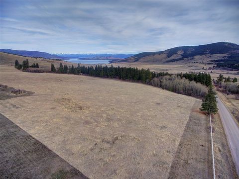 Photo of 31365 Walking Horse Lane, Big Arm, MT 59910 (MLS # 30066314)