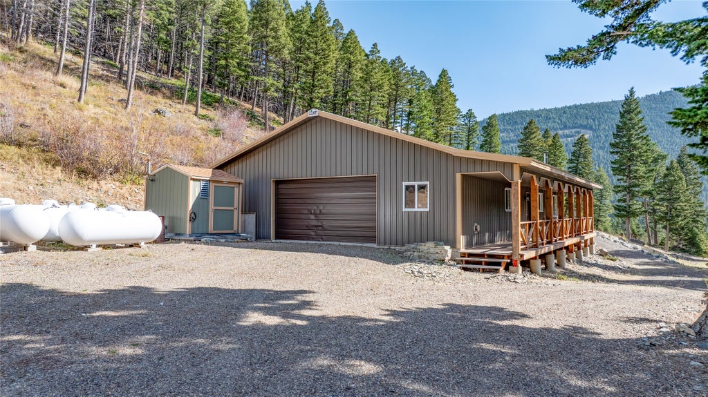 Photo of 4476 Woods Creek Road, Wolf Creek, MT 59648 (MLS # 30079884)