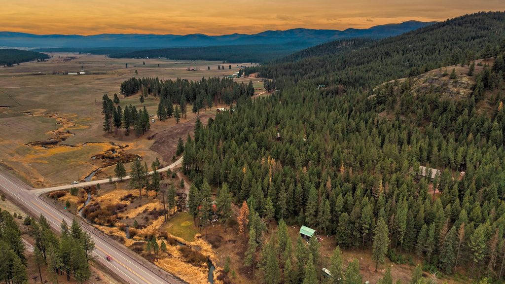 Photo of 24003 Sidehill Lane, Bonner, MT 59823 (MLS # 30068535)