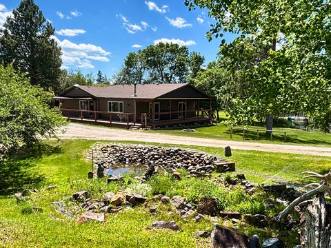 Photo of 5945 Heartache Road, East Helena, MT 59635 (MLS # 30073150)