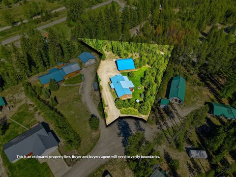 Tiny photo for 77 Rudolph Court, Haugan, MT 59842 (MLS # 30070359)
