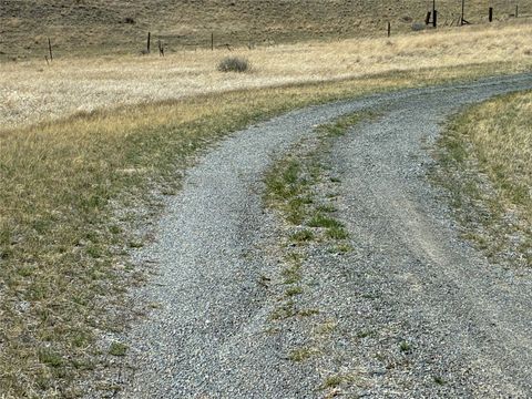 Photo of 348 Cottonwood Road, Cardwell, MT 59721 (MLS # 30068150)