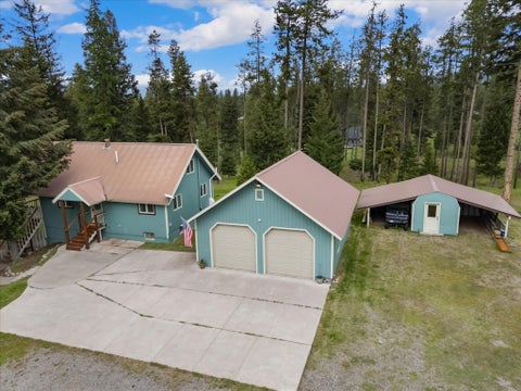 Photo of 290 Drew Creek Loop, Seeley Lake, MT 59868 (MLS # 30072745)