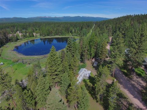 Photo of 521 Seeley Lane, Seeley Lake, MT 59868 (MLS # 30073482)