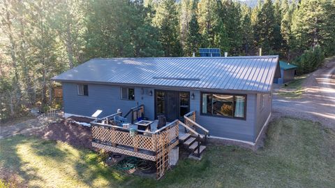 Photo of 3671 French Creek Road, Wolf Creek, MT 59648 (MLS # 30060445)