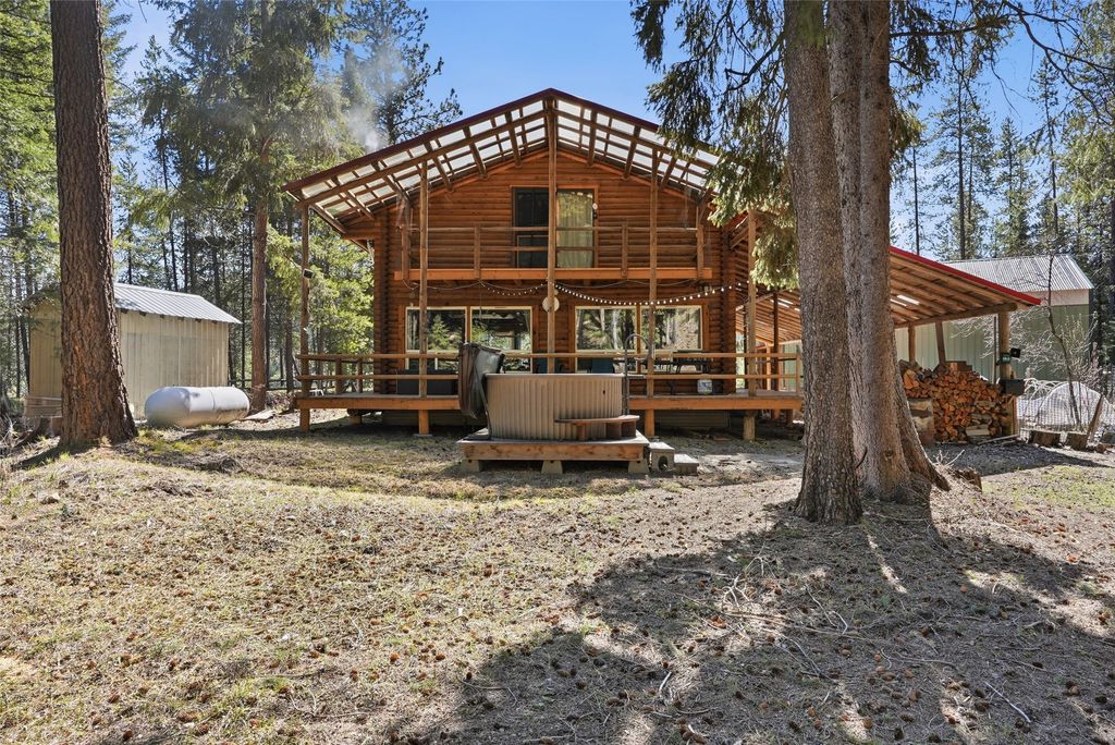 Photo of 136 Brown Bear Lane, De Borgia, MT 59830 (MLS # 30070038)