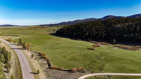 Tiny photo for TBD Indian Creek Road, Helmville, MT 59843 (MLS # 30071037)