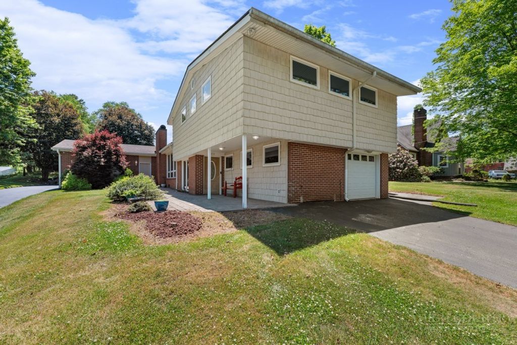 Photo of 201 E Buck Mountain Road, West Jefferson, NC 28694 (MLS # 261599)