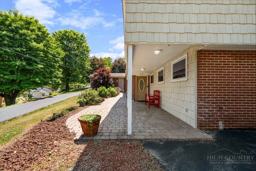 Photo of 201 E Buck Mountain Road, West Jefferson, NC 28694 (MLS # 261599)