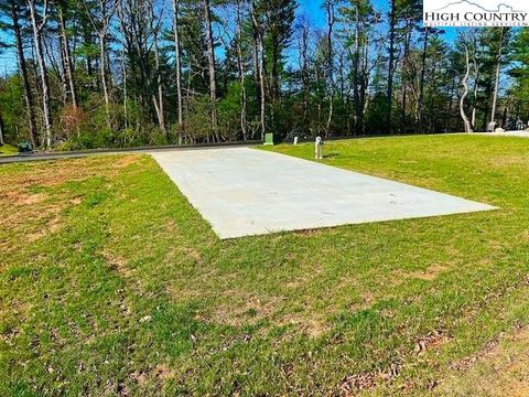 Photo of 97 Gleneagles North, Roaring Gap, NC 28668 (MLS # 260903)