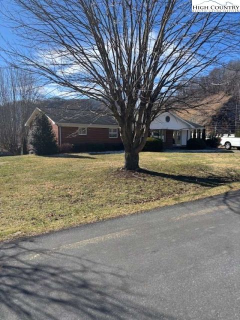 Photo of 116 River Drive, Warrensville, NC 28693 (MLS # 259945)