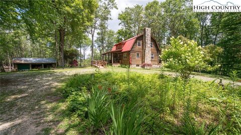 Photo of 692 Buck Hill Road, Newland, NC 28657 (MLS # 256442) Photo of 692 Buck Hill Road, Newland, NC 28657 (MLS # 256442)