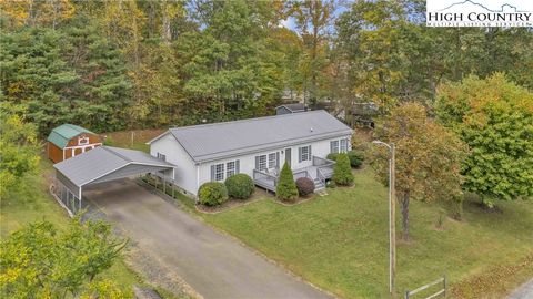 Photo of 146 Poplar Lane, Lansing, NC 28643 (MLS # 258546)
