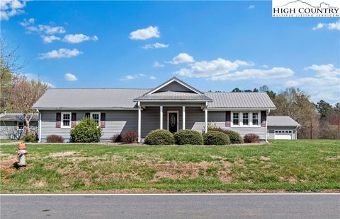 Photo of 613 Nc Highway 67, Boonville, NC 27011 (MLS # 260541)