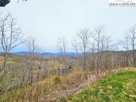 Photo of 851 E Whenlin Ridge Road, Lansing, NC 28643 (MLS # 258813) Photo of 851 E Whenlin Ridge Road, Lansing, NC 28643 (MLS # 258813)