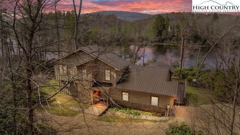 Photo of 342 Ripshin Lake Road, Roan Mountain, TN 38687 (MLS # 261023)
