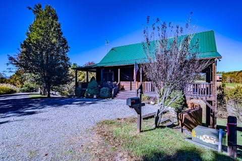 Photo of 432 W Ridge Road, Piney Creek, NC 28663 (MLS # 265046)