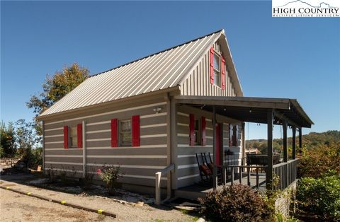 Photo of 292 River Bend Hills Road, Crumpler, NC 28617 (MLS # 258700)