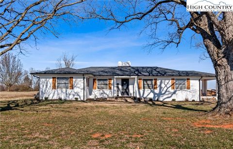 Photo of 2432 Holcomb Road, Yadkinville, NC 27055 (MLS # 259783)