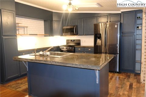 Photo of 618 Rhymer Branch Road, Deep Gap, NC 28618 (MLS # 255387)