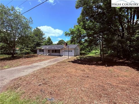 Photo of 147 Greensboro Heights, Crumpler, NC 28617 (MLS # 256263) Photo of 147 Greensboro Heights, Crumpler, NC 28617 (MLS # 256263)