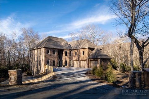 Photo of 216 Greenbriar Road, Beech Mountain, NC 28604 (MLS # 265002)
