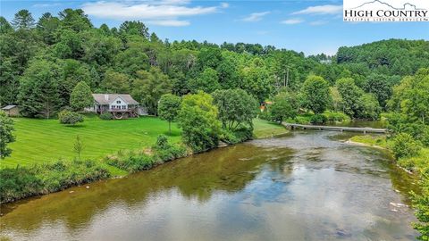 Photo of 492 Beau Rivage Drive, Crumpler, NC 28617 (MLS # 256027) Photo of 492 Beau Rivage Drive, Crumpler, NC 28617 (MLS # 256027)